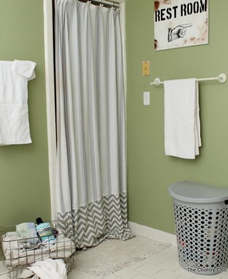 How to Make an Extra Long Shower Curtain -- add length to your shower curtain so it goes all the way from floor to ceiling. A great project to fix those curtains that are too short.