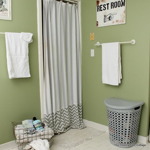 How to Make an Extra Long Shower Curtain -- add length to your shower curtain so it goes all the way from floor to ceiling. A great project to fix those curtains that are too short.