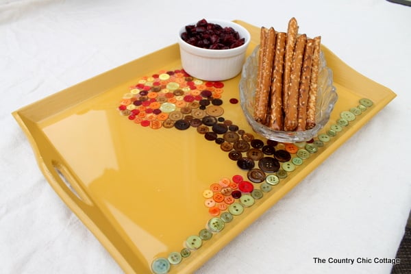 Make a Fall Tray -- use buttons to make a fall scene on a tray then pour on a two part epoxy! Full instructions for making your own by clicking!