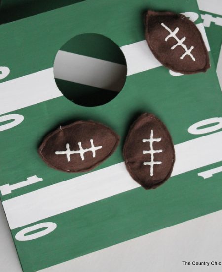Mini Football Cornhole Game -- a fun mini size version of the original. Perfect for kids or indoors! Click here to see how to make your own.