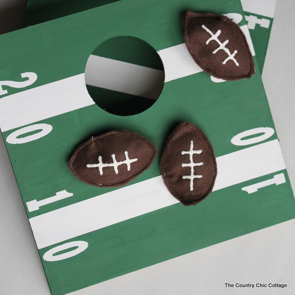 Mini Football Cornhole Game -- a fun mini size version of the original.  Perfect for kids or indoors!  Click here to see how to make your own.