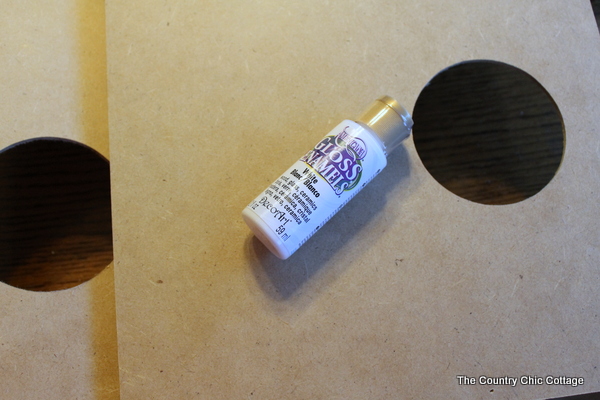 Mini Football Cornhole Game -- a fun mini size version of the original. Perfect for kids or indoors! Click here to see how to make your own.