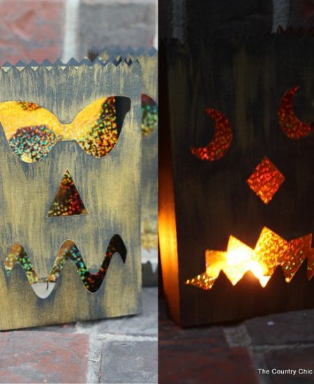 Halloween Luminary Bags with the Cricut Explore -- cut these fun bags, paint, and add a candle. These amazing black and gold bag with light up the night at your Halloween party!