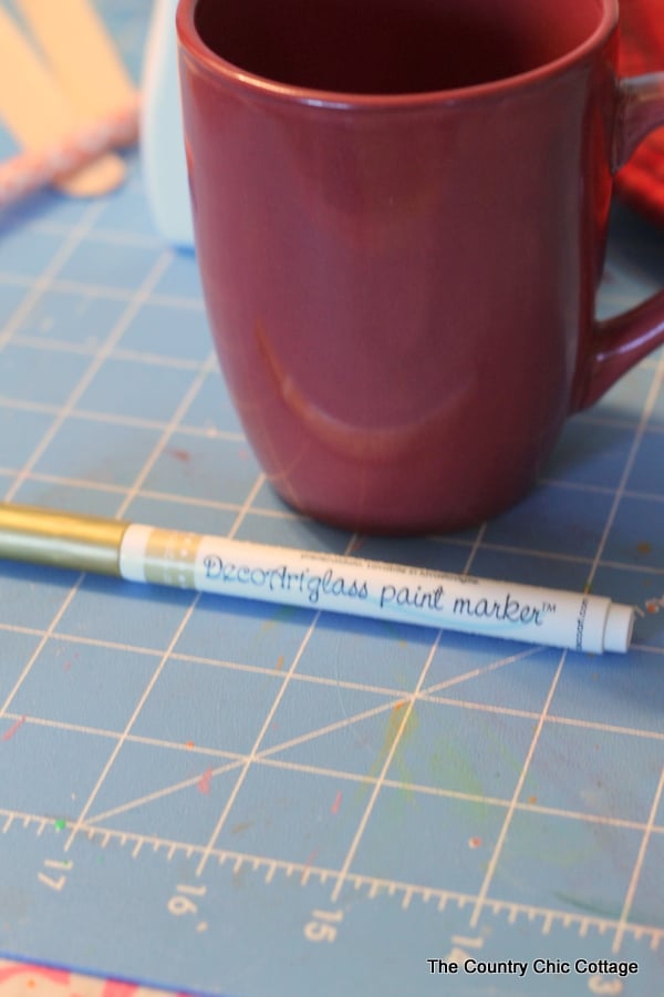 Fall Coffee Mugs -- use a simple paint pen to make fall themed coffee mugs in minutes!