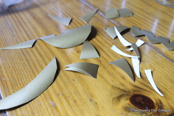 cutting out spooky faces on adhesive vinyl