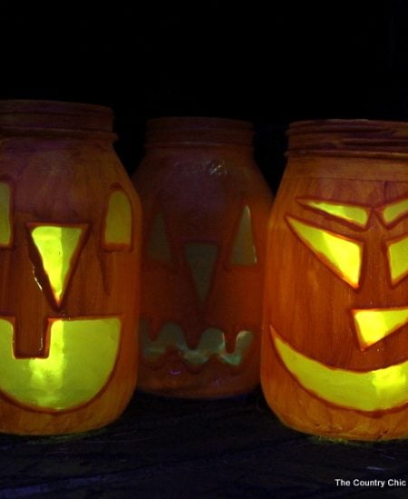 Halloween Jar Luminaries -- light up the night this Halloween with these quick and easy to make mason jar luminaries!