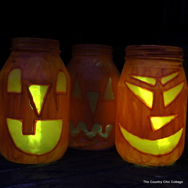 Halloween Jar Luminaries -- light up the night this Halloween with these quick and easy to make mason jar luminaries! 