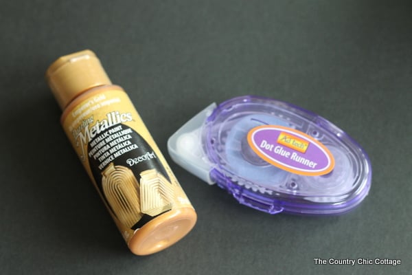 Gold metallic paint and glue dot runner