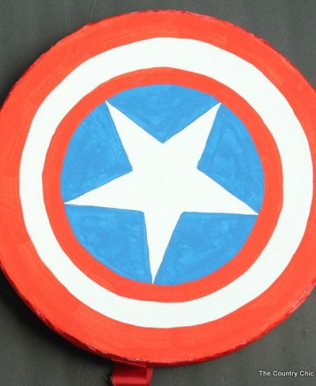 Make your own Captain America shield -- a wreath form and some poster board can be easily turned into a Halloween costume accessory!