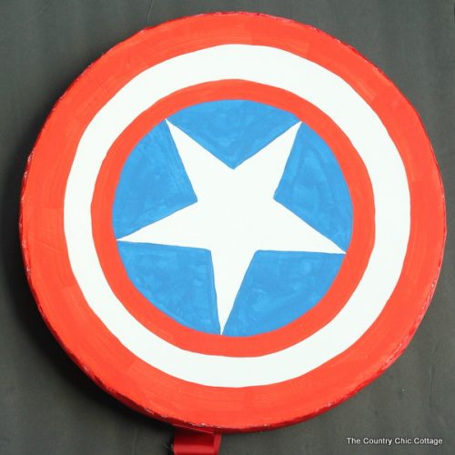 Make your own Captain America shield -- a wreath form and some poster board can be easily turned into a Halloween costume accessory!
