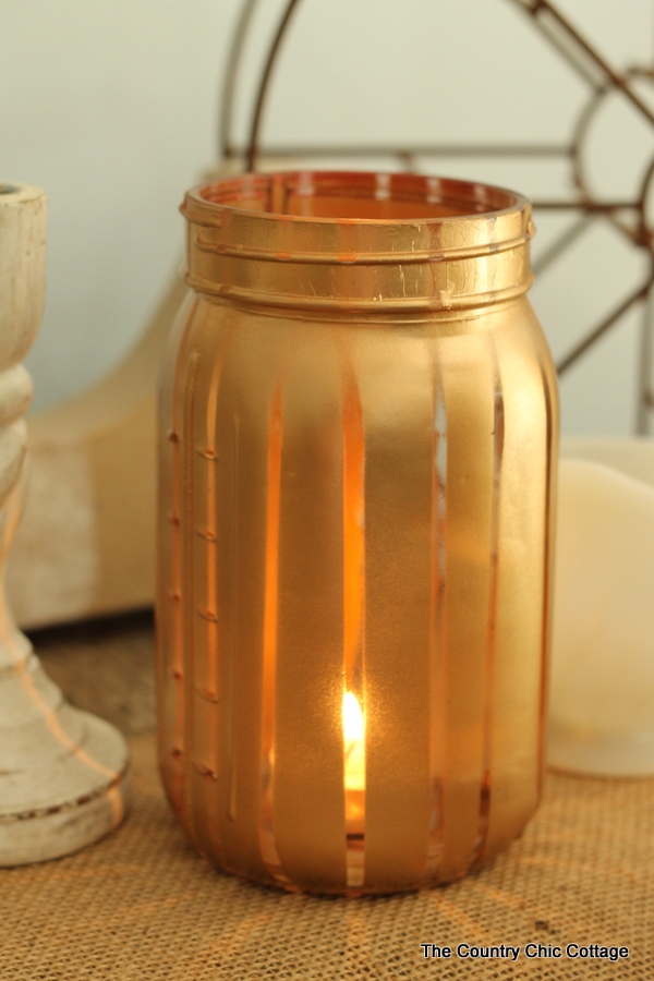 painted glass jar with vertical stripes