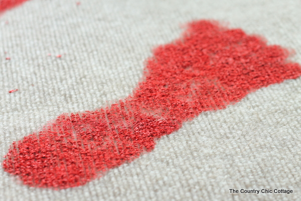 painting bloody footprint on doormat