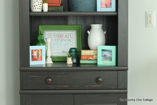 Style a Bookcase in 4 minutes or less -- tips and techniques on arranging items in a bookcase or any shelf!