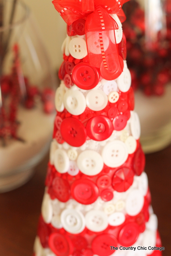 creating a christmas cone tree with red ribbon