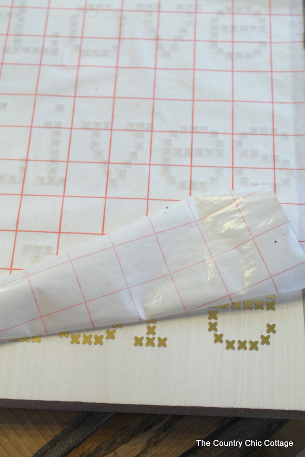 applying transfer paper to vinyl