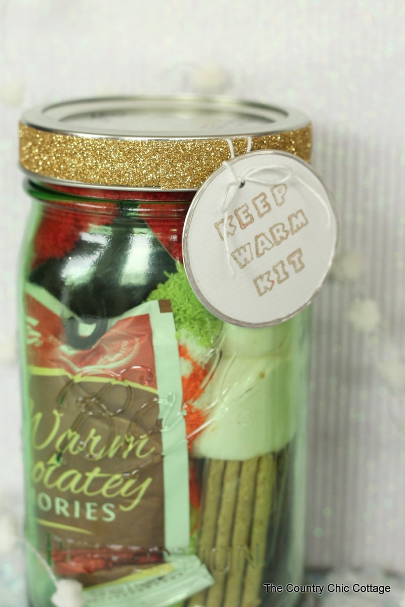 Keep warm kit gift in a jar -- perfect for cold winter holidays! See the list of things to add to this fun mason jar gift idea!