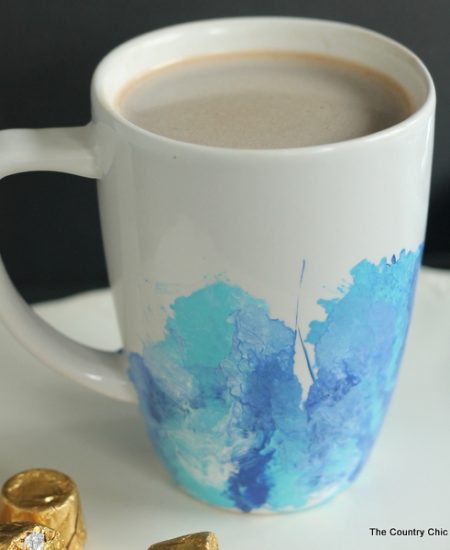 Make your own marbled mug with this great craft tutorial. A simple technique using craft paint and a straw.