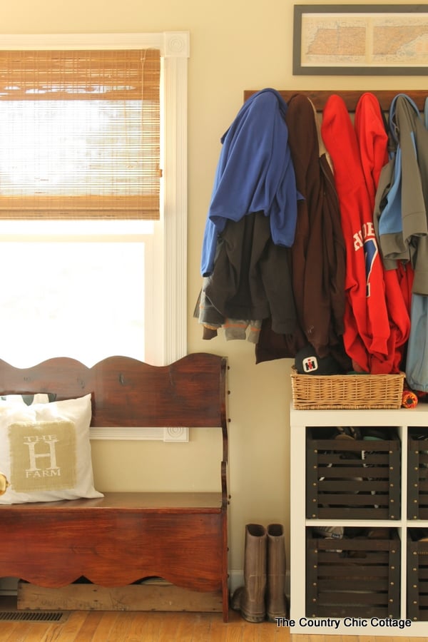 Farmhouse mudroom ideas, a bench and cube organizer for entryway decor