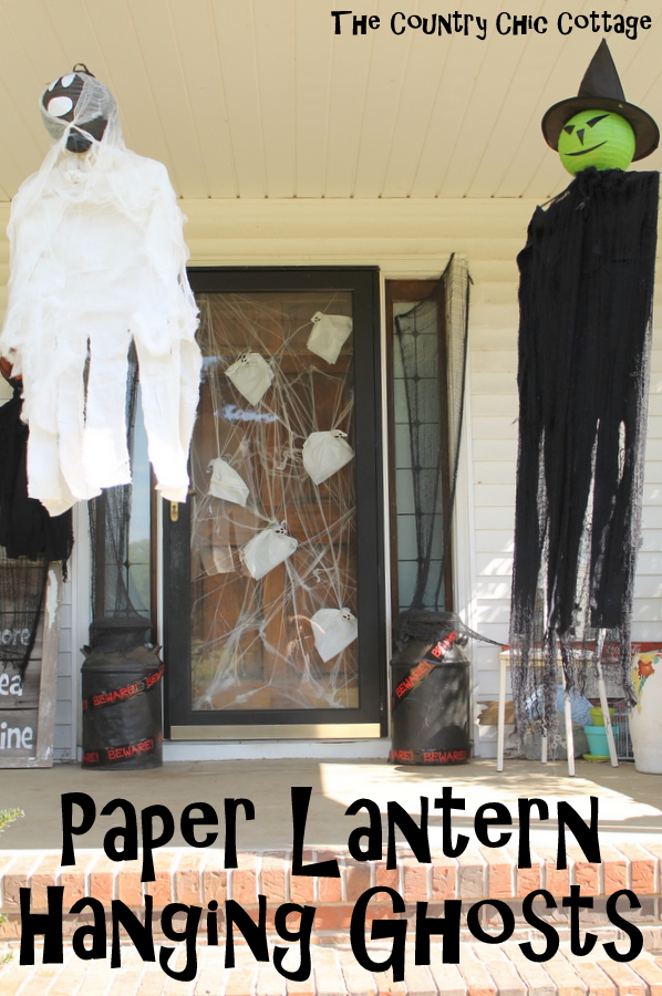 Paper Lantern Hanging Ghosts -- add these inexpensive Halloween decorations to your outdoor decor in just a few minutes!