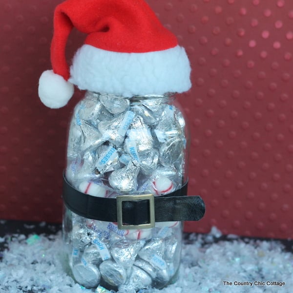 Santa gift in a jar with red background