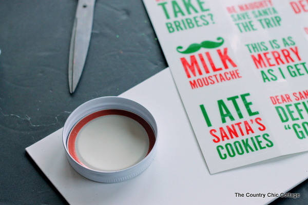 assembling a mason jar lid to make a ornament