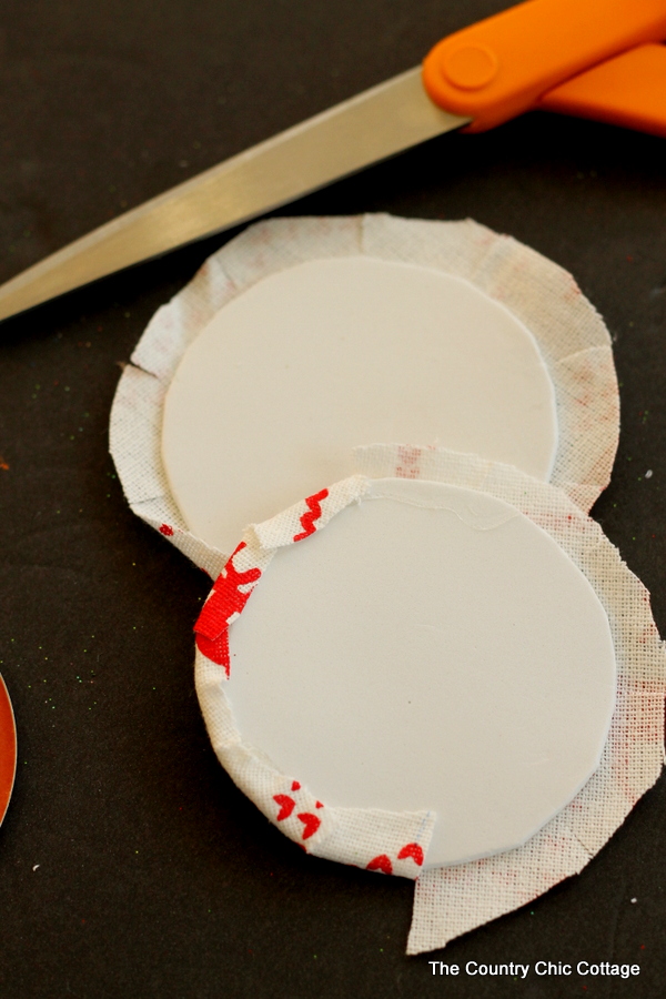 using fabric to make mason jar lid ornaments