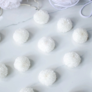 DIY Snowball pom poms by Our Happy Tribe