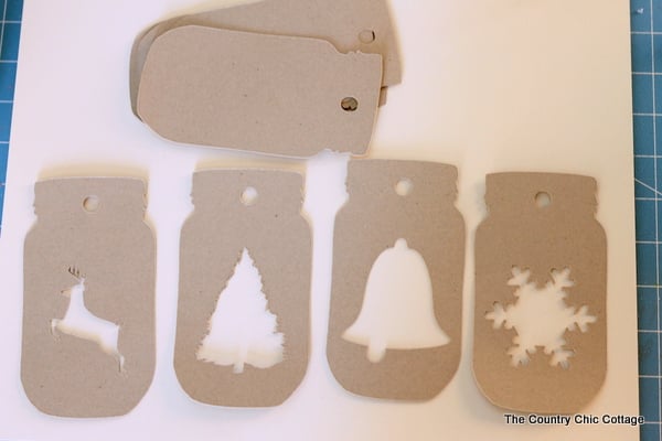 Make these glittered mason jar ornaments easily with a Cricut Explore. Click here to learn how!