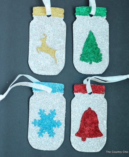 Make these glittered mason jar ornaments easily with a Cricut Explore. Click here to learn how!