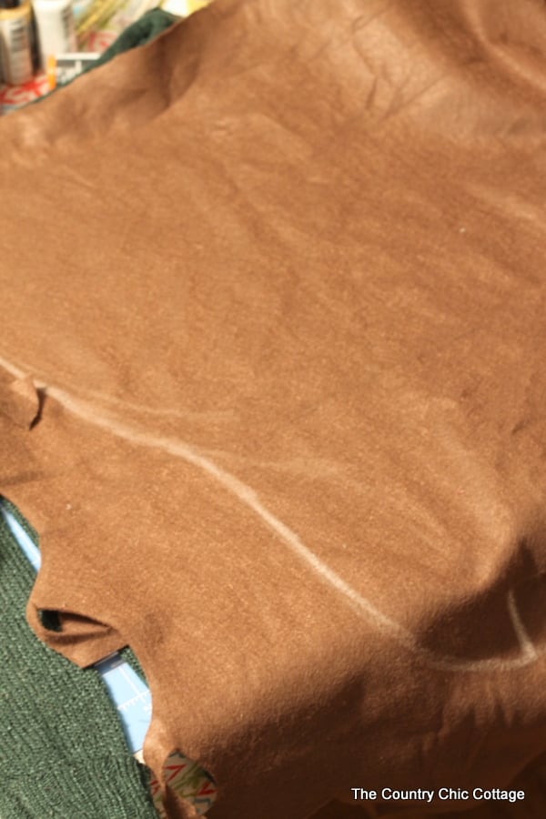 large piece of felt with chalk outline
