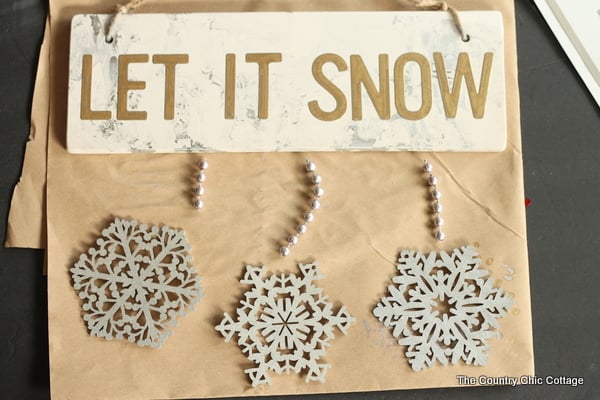 Metallic Let it Snow Sign -- Add some metallic to your home decor or front door this winter by making this fun sign.