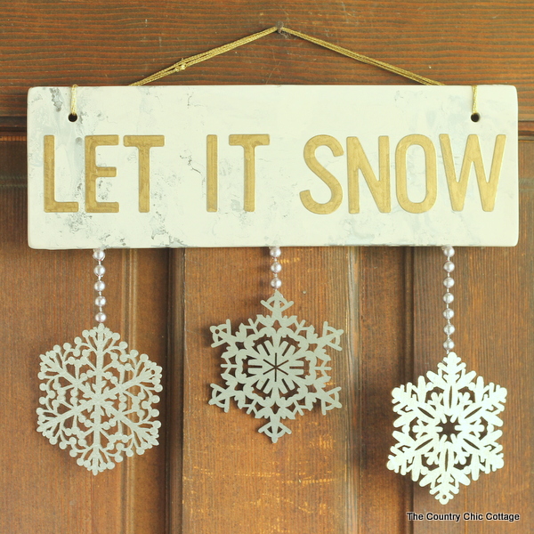 Metallic Let it Snow Sign -- Add some metallic to your home decor or front door this winter by making this fun sign.