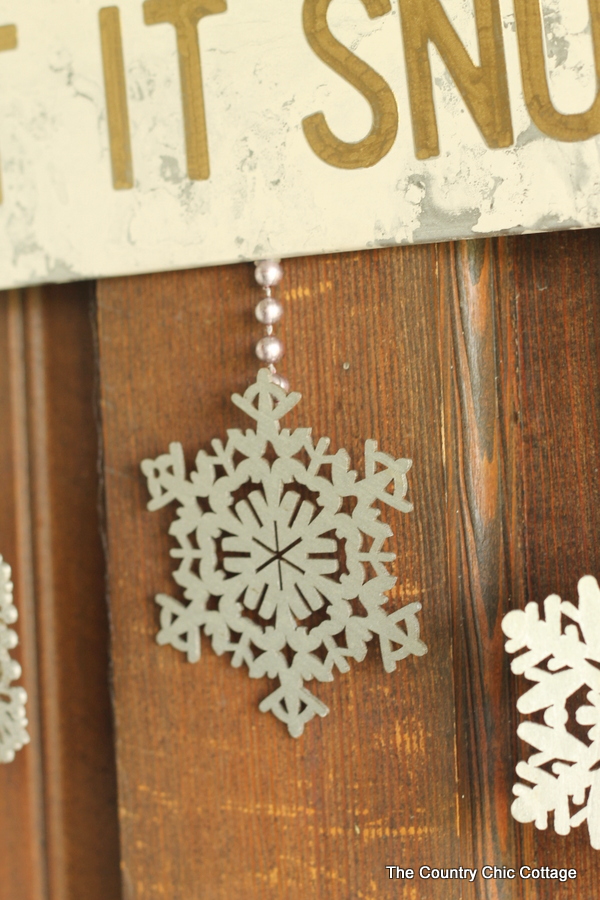 Metallic Let it Snow Sign -- Add some metallic to your home decor or front door this winter by making this fun sign.