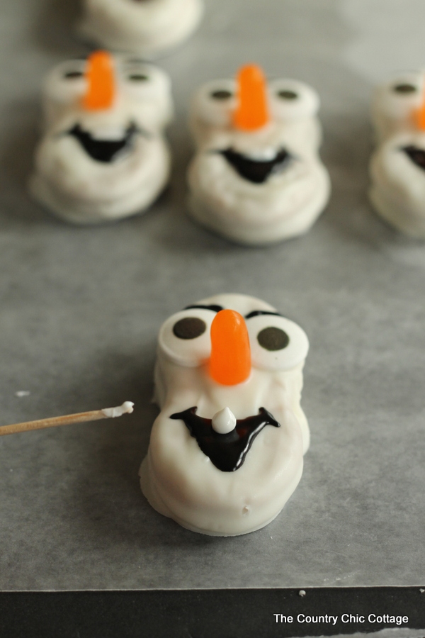 Olaf Nutter Butter Cookies -- fun cookies to serve up this Christmas, winter, or anytime of the year!  Watch the Disney Frozen movie and eat a batch of Olaf cookies!