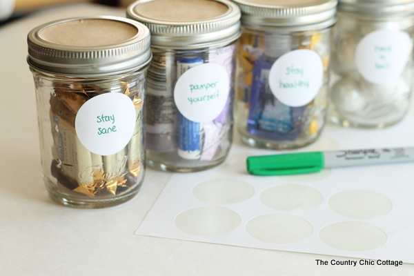 A fun stacked gift in a jar with labels