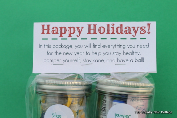 A fun stacked gift in a jar with a free printable topper. Give them everything they need to start the new year off right!