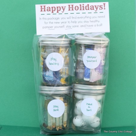 A fun stacked gift in a jar with a free printable topper. Give them everything they need to start the new year off right!