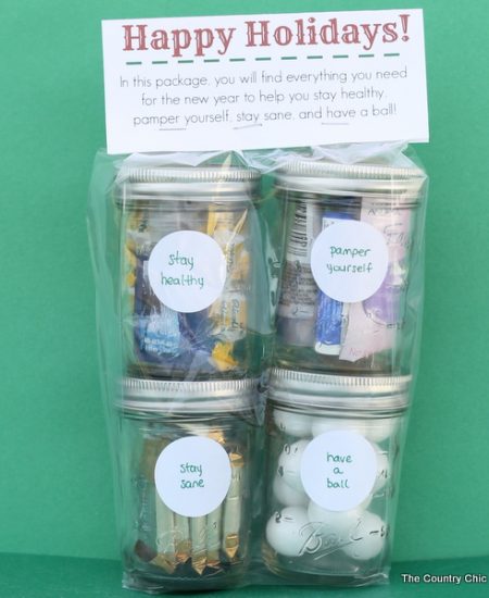 A fun stacked gift in a jar with a free printable topper. Give them everything they need to start the new year off right!