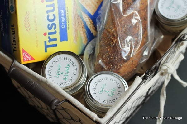 close up of mason jars with cheese spread and printed labels