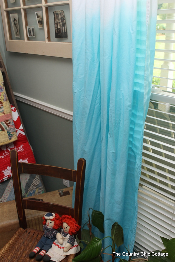 Turn plain white sheets into dip dyed curtains