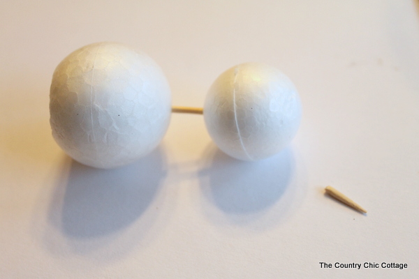 attaching foam balls to each other with toothpicks