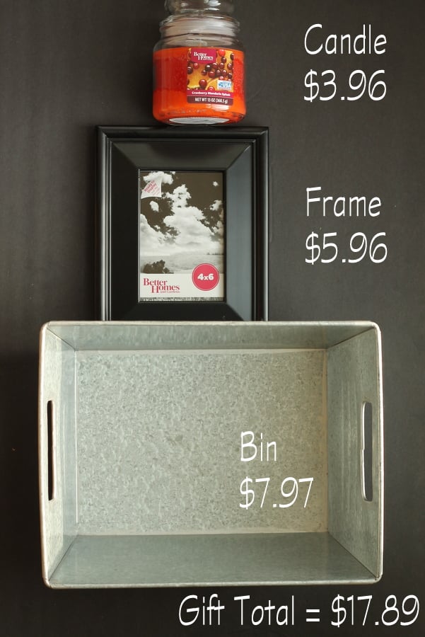 This gift idea is for anyone who loves home decor! A lovely fall scented candle, a simple picture frame, and a storage bin is a great gift for under $20