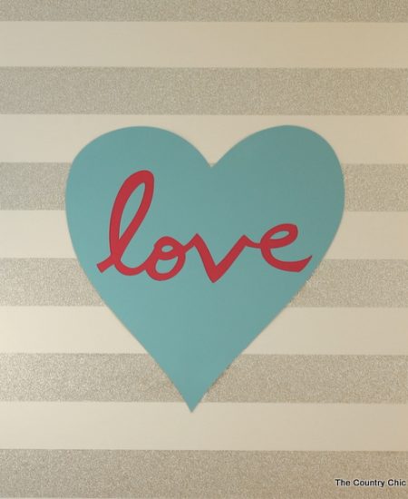 Love Canvas Art -- make this art for your home with duck tape and some vinyl cutouts -- super easy and gorgeous!