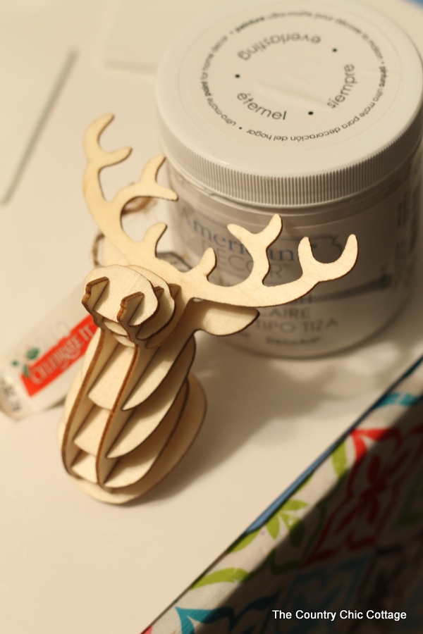 Make your own mounted deer head ornament with supplies from Michaels! A fun project that would look great on your tree!