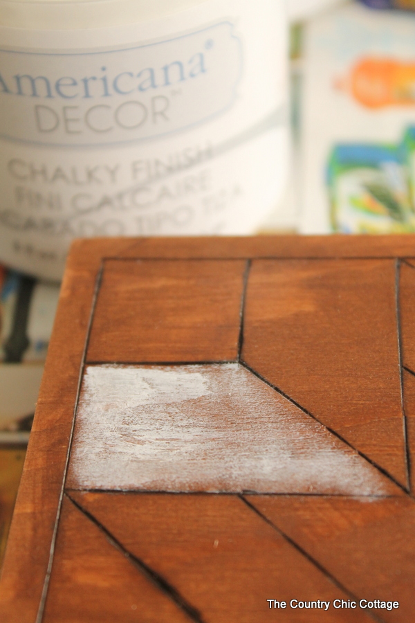 Start painting any section of your wood quilt square