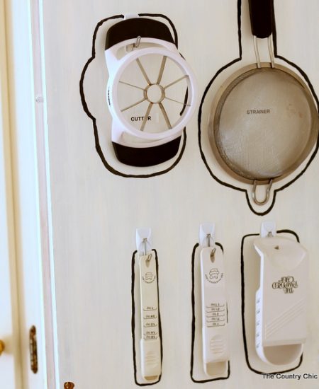 Cabinet Door Organization -- use the pack of your door to hang necessities and get organized!