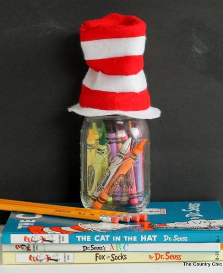 A free pattern to sew a mini Dr. Seuss hat for the top of a mason jar. Makes a great teacher gift idea!