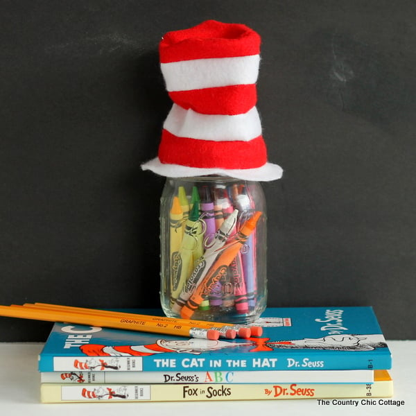 A free pattern to sew a mini Dr. Seuss hat for the top of a mason jar. Makes a great teacher gift idea!