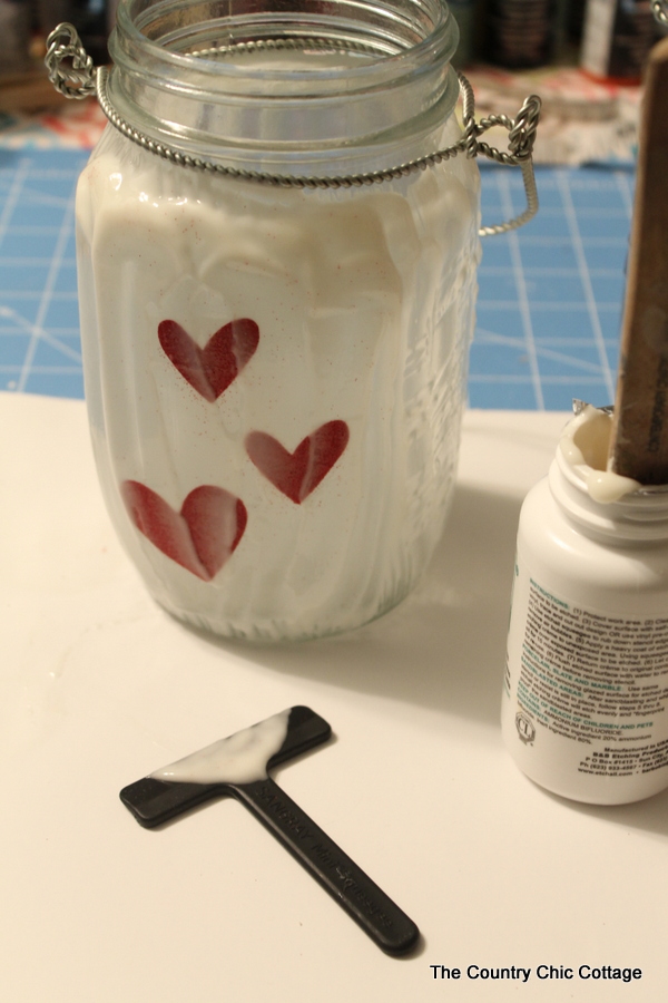 Glass etched mason jar lanterns -- perfect for weddings and so easy to make! I had no idea they made etching cream that you could re-use over and over!