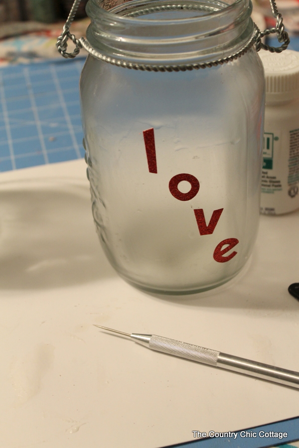 Glass etched mason jar lanterns -- perfect for weddings and so easy to make! I had no idea they made etching cream that you could re-use over and over!